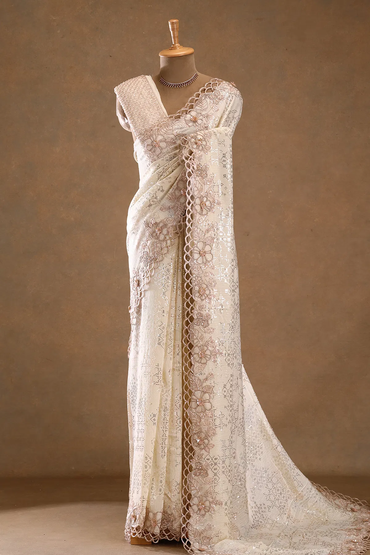 Cream sequins embroidered georgette designer saree